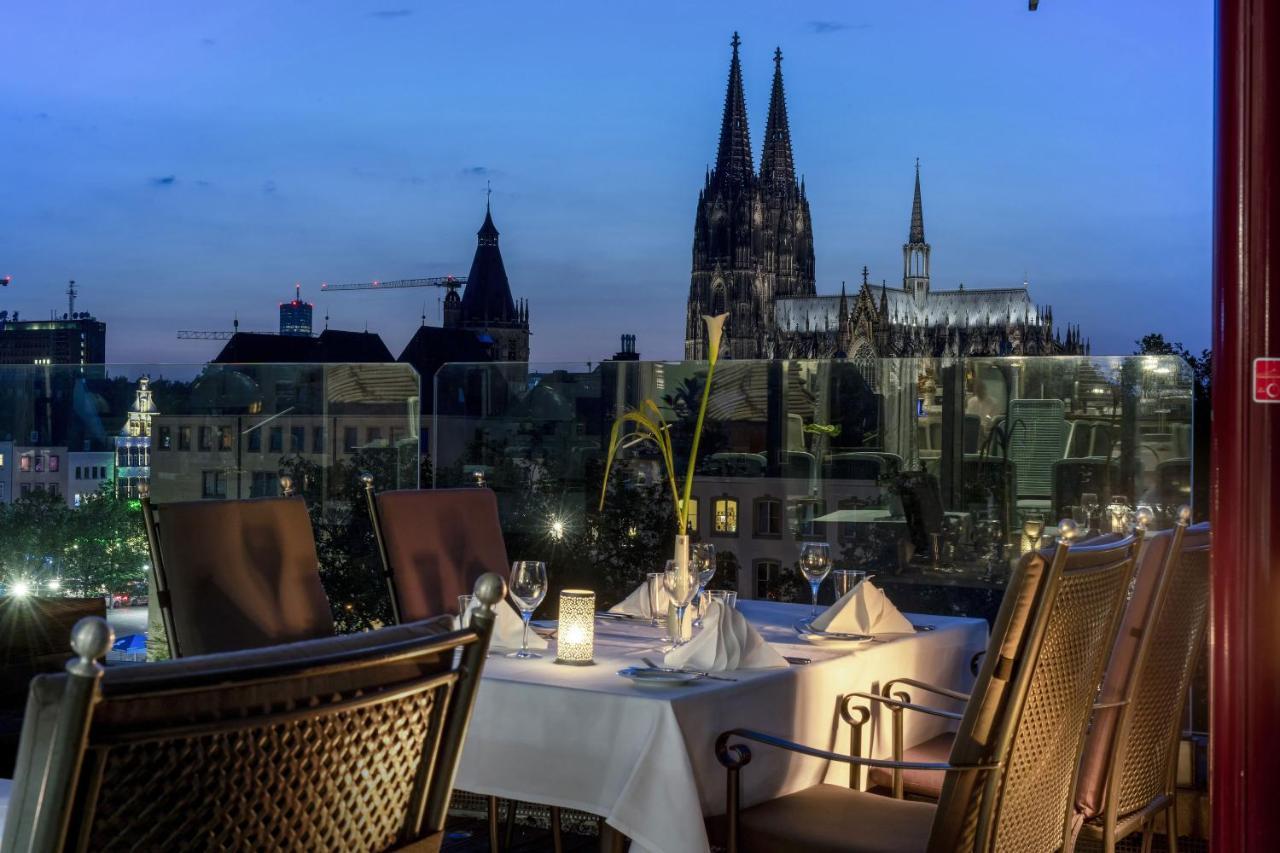 فندق ماريتيم كولونيا المظهر الخارجي الصورة The view of the Cologne Cathedral from the terrace of the restaurant
